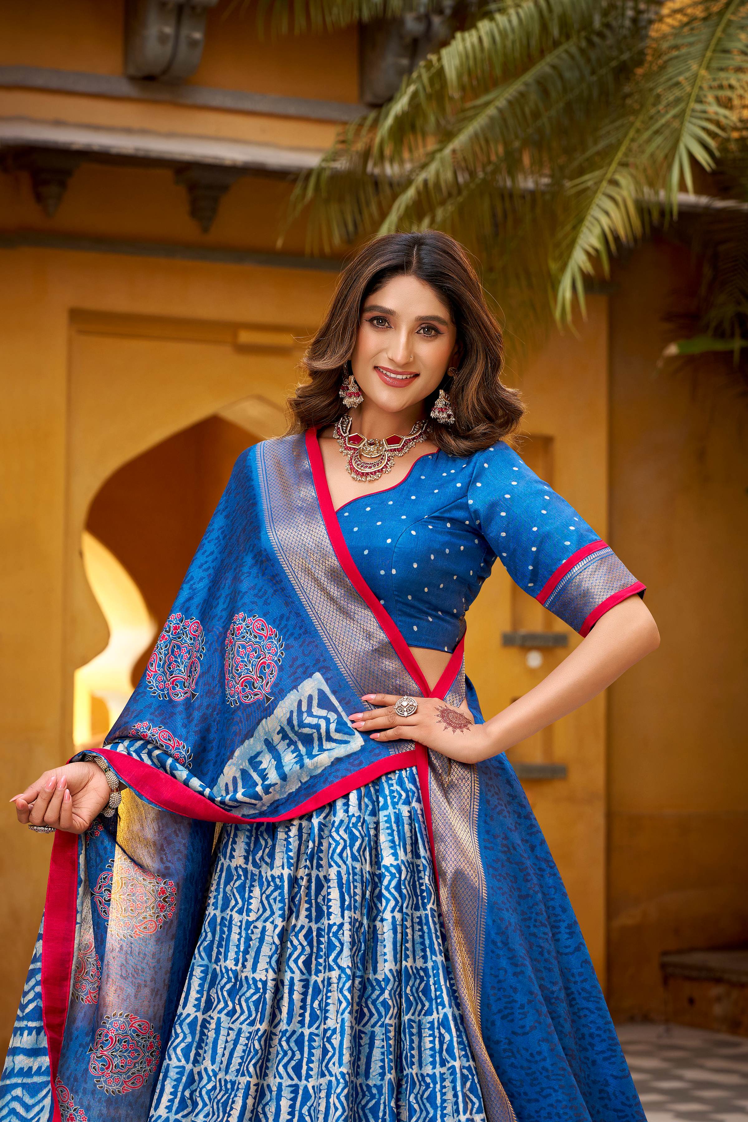 Dola Silk Lehenga Choli featuring traditional batik art