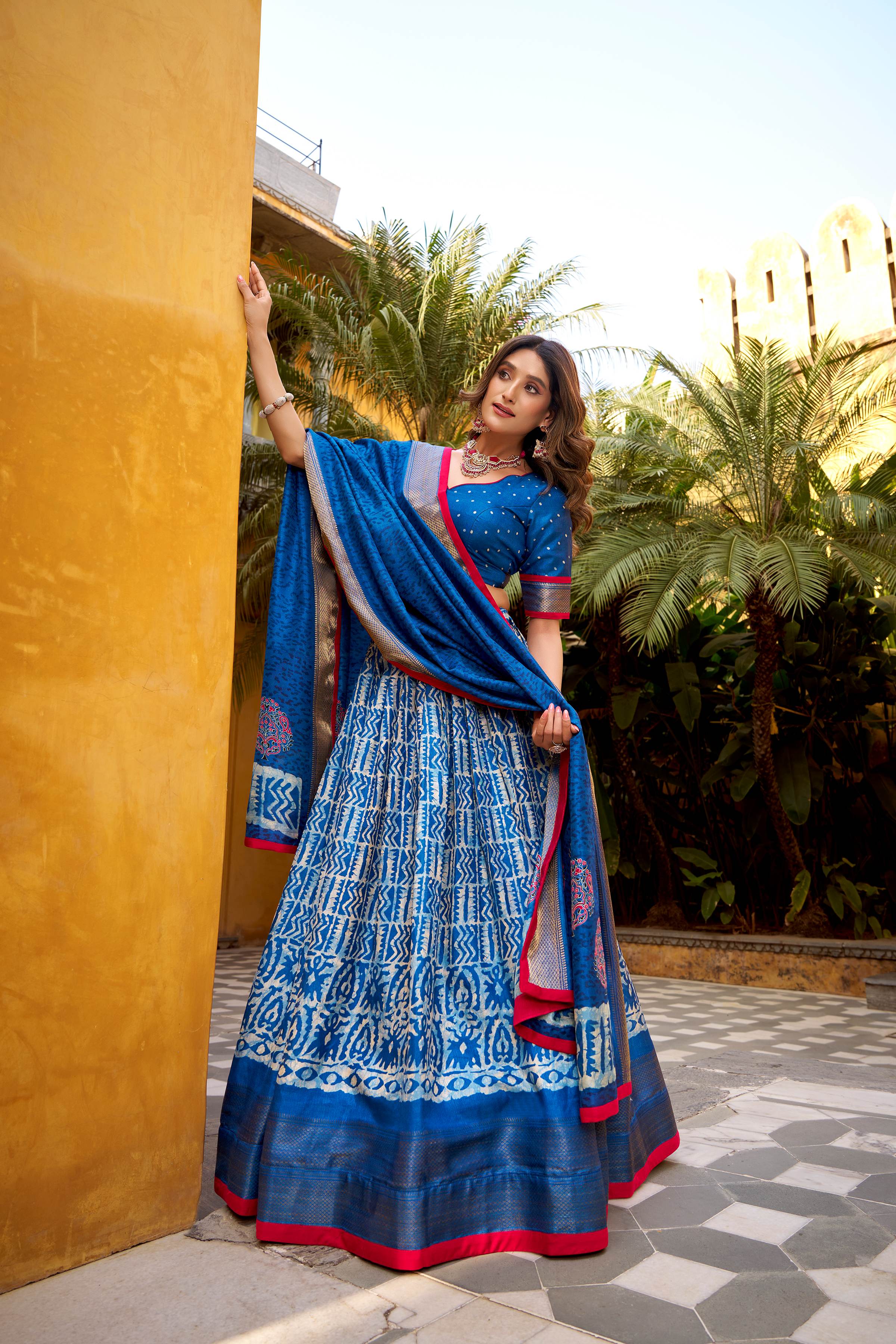Dola Silk Lehenga Choli featuring traditional batik art