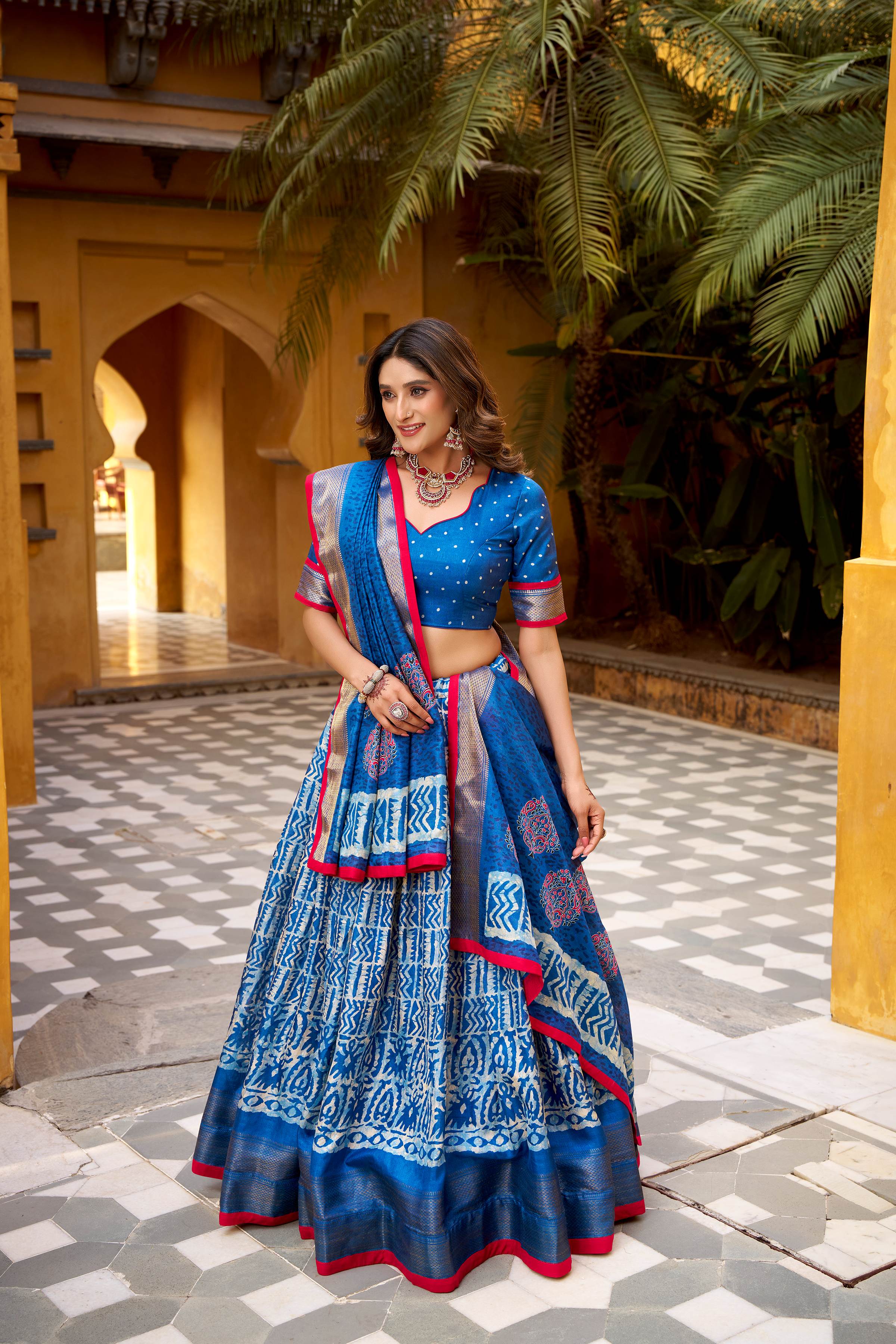 Dola Silk Lehenga Choli featuring traditional batik art
