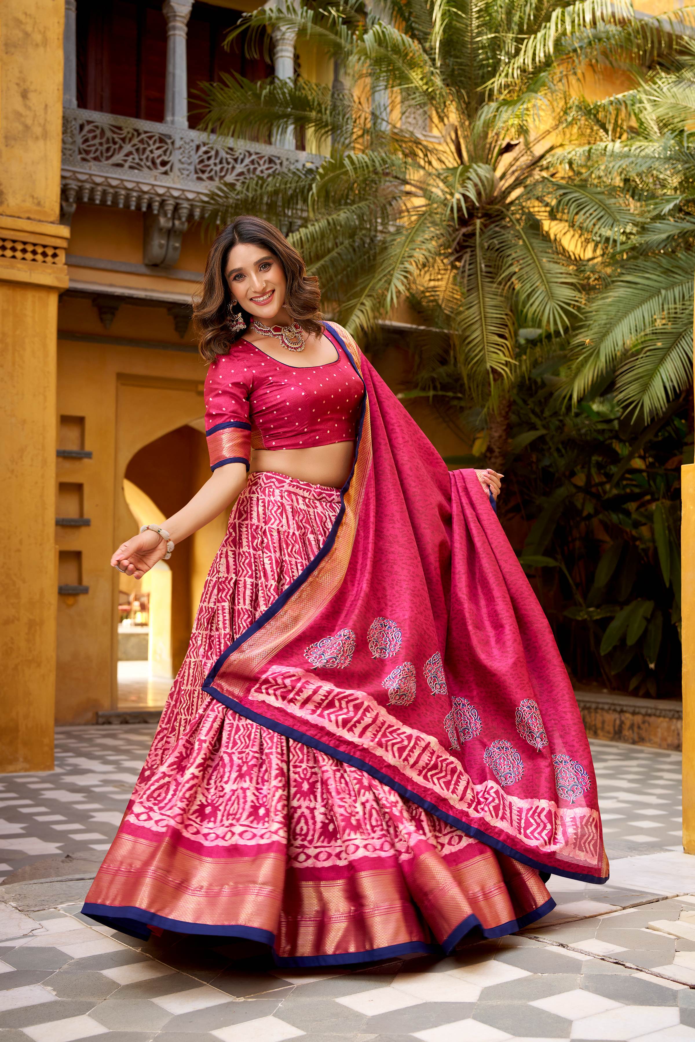 Dola Silk Lehenga Choli featuring traditional batik art