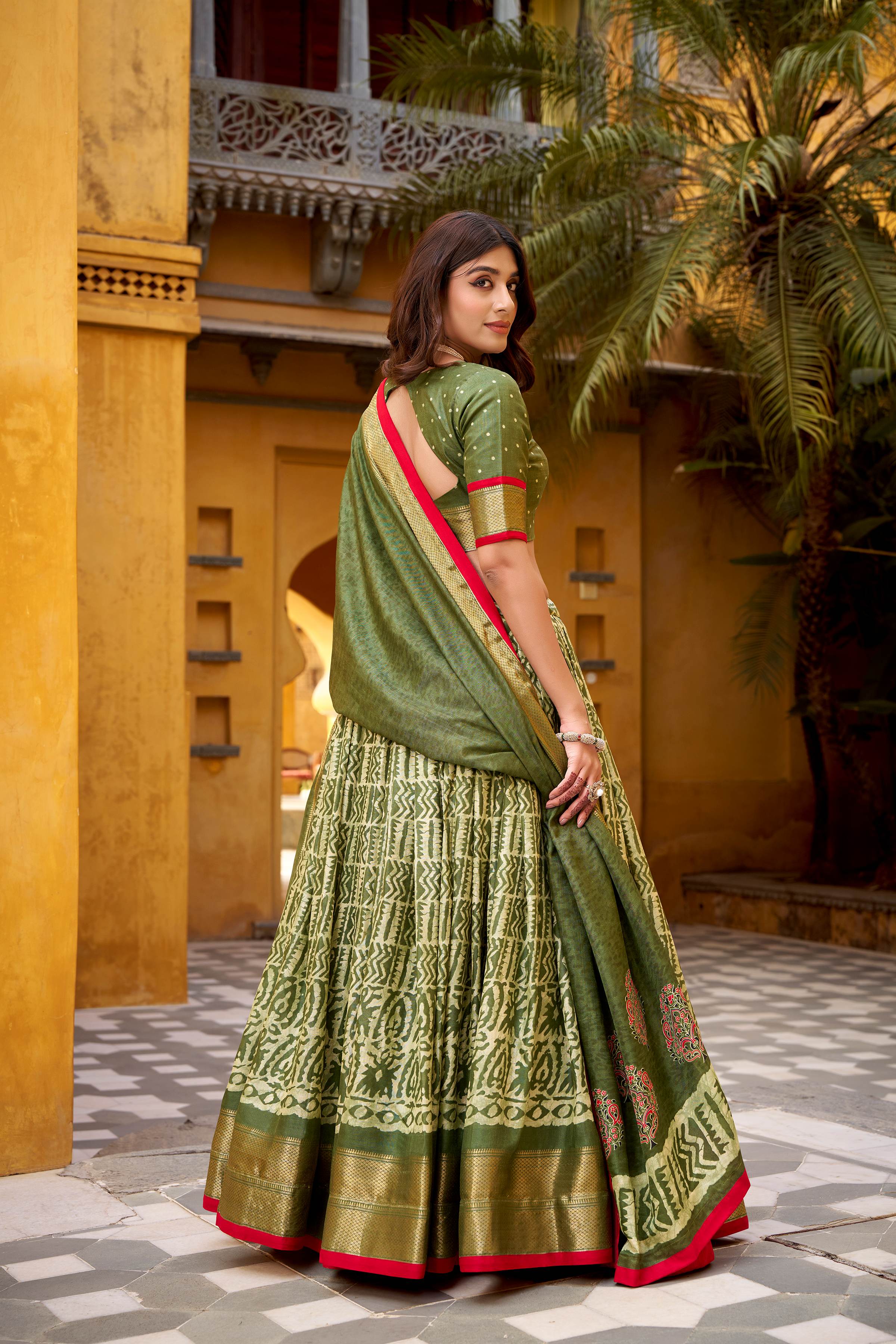 Dola Silk Lehenga Choli featuring traditional batik art