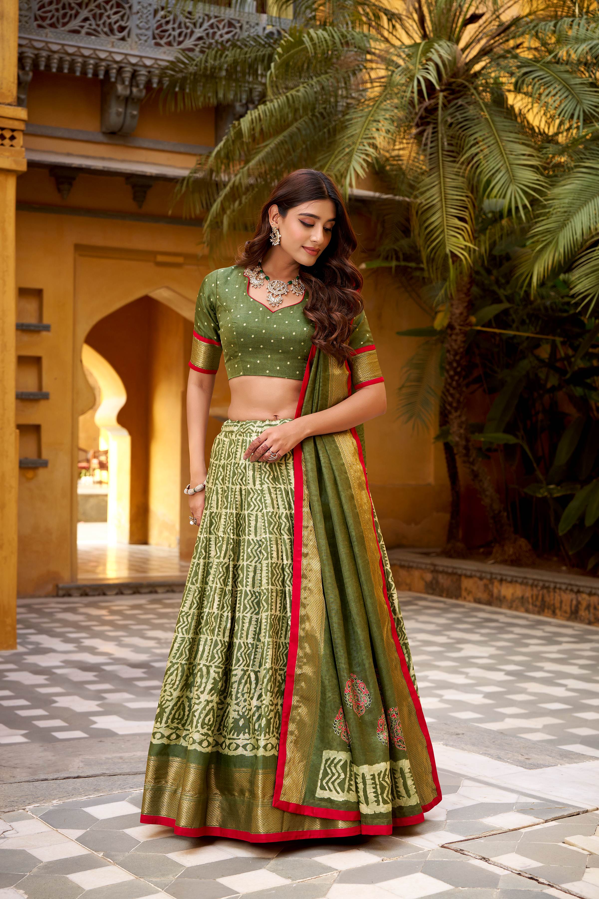 Dola Silk Lehenga Choli featuring traditional batik art
