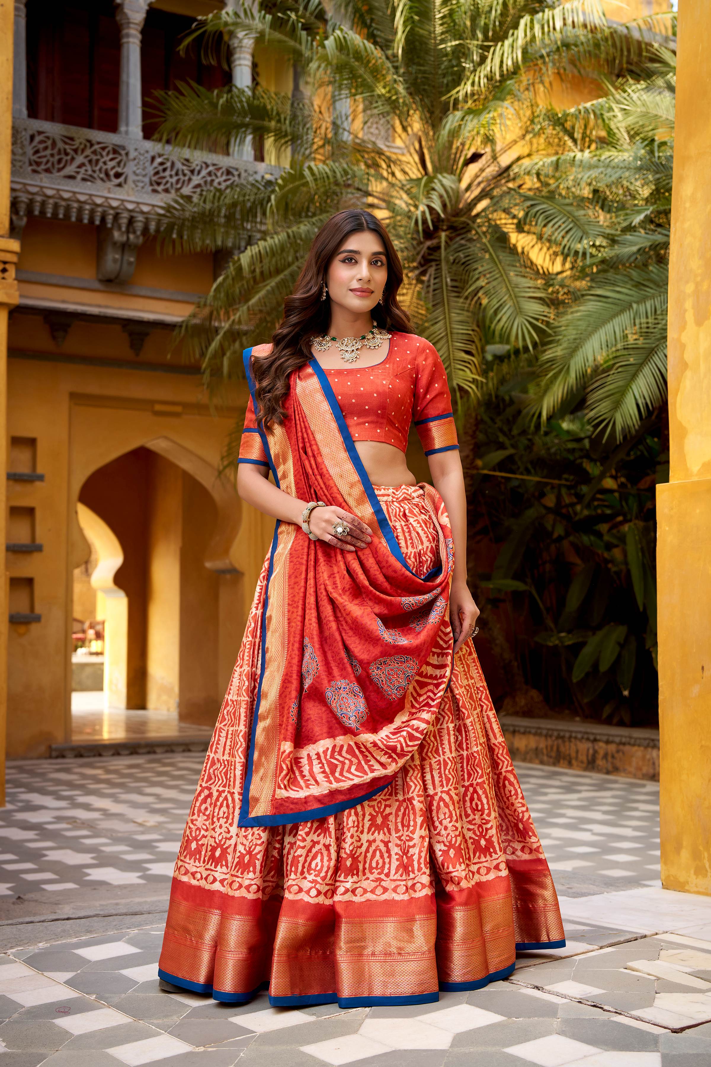 Dola Silk Lehenga Choli featuring traditional batik art